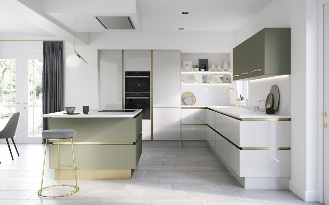 a white and green kitchen with brass accents and an island